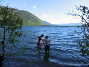 M&E wading in Lake McDonald